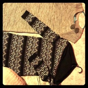 Two sweater dresses from crazy 8’s kids store.